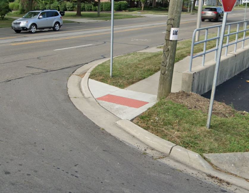 Accessible curb ramp and pedestrian path at a public park